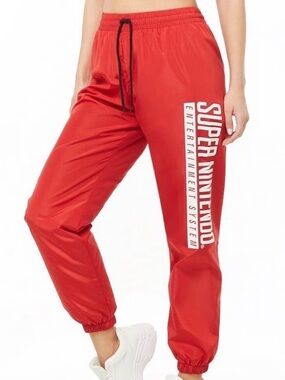 Nintendo Red Nylon Track Jogger Sweatpants with White 'Super Nintendo' Side Logo